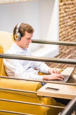 If Your Office Space is Loud, Offer Employees Noise Cancelling Headphones to Use At their Desk